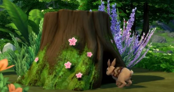 sims-4-cottage-living-bunny-hides-in-tree-stump