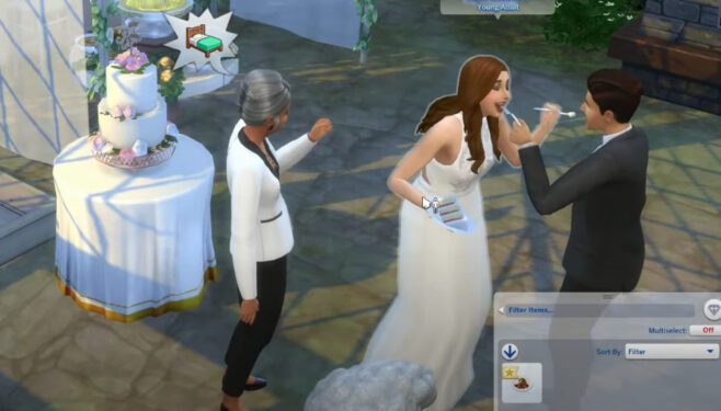Sims-feeding-each-other-wedding-cake